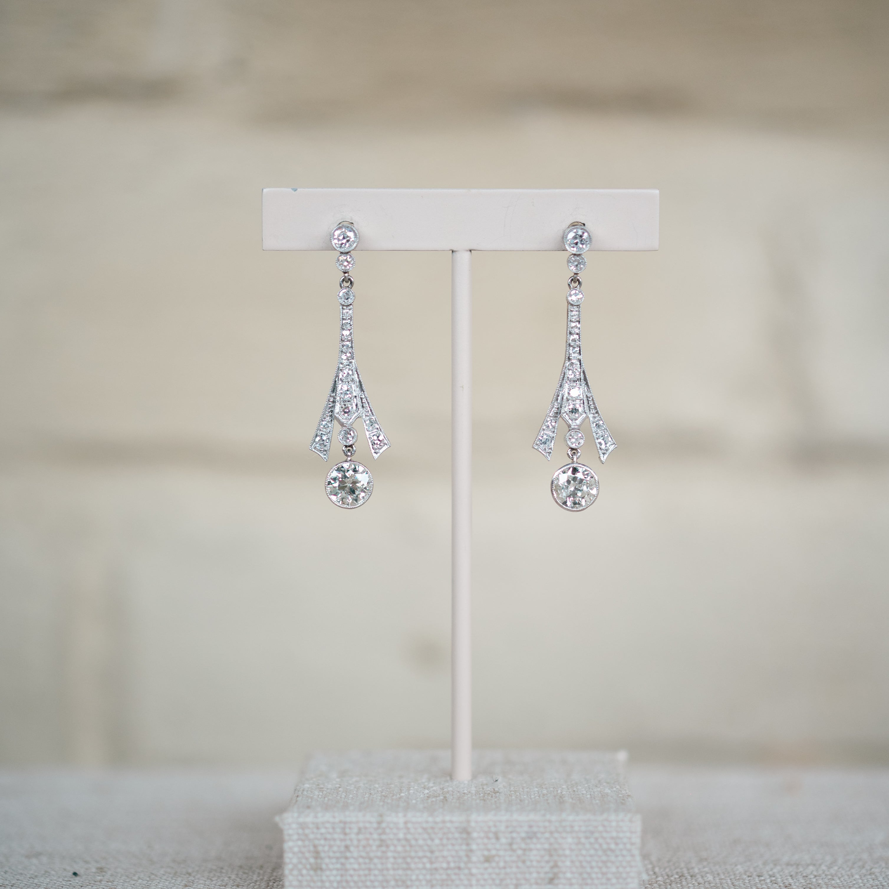 platinum diamond dangle earrings