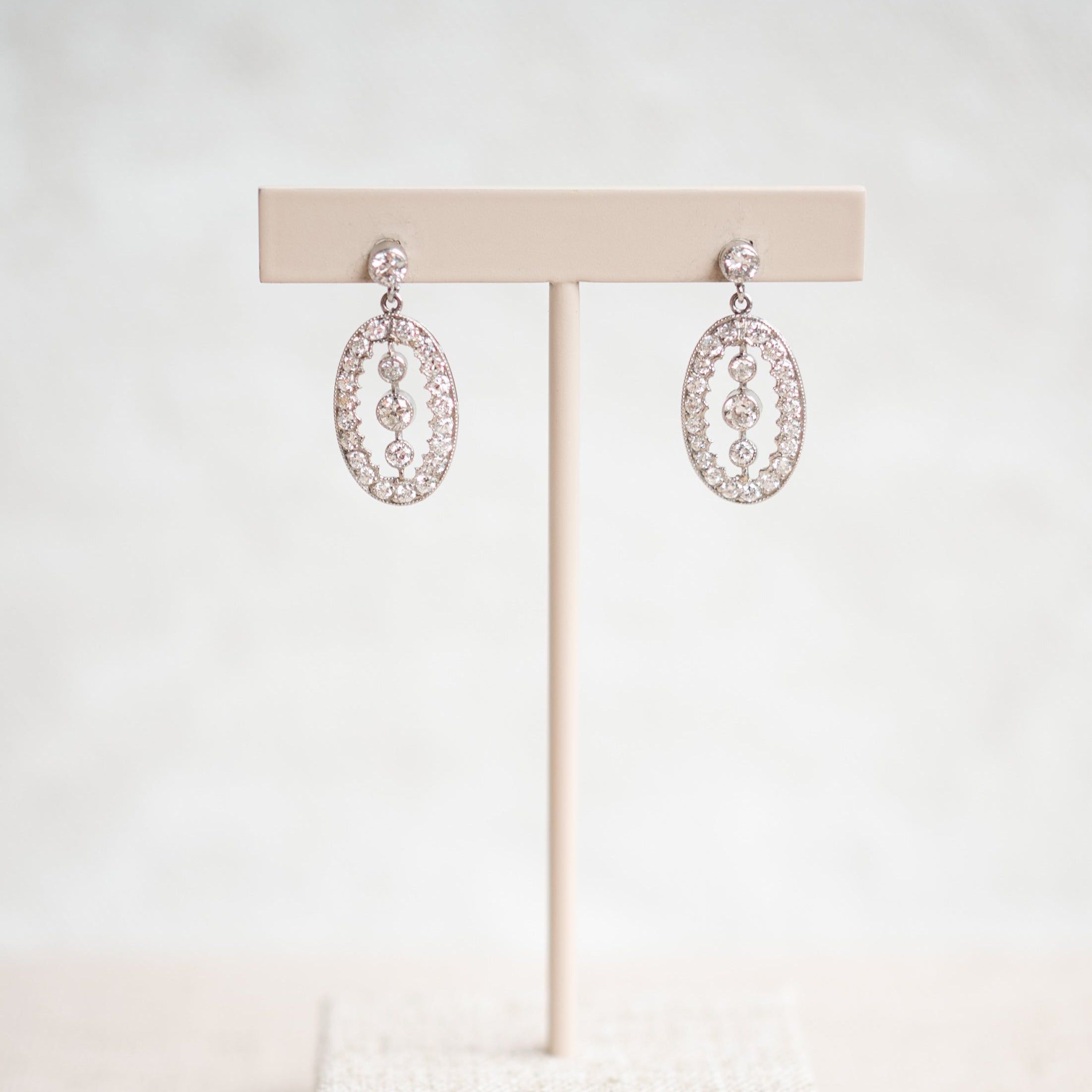 platinum diamond dangle earrings