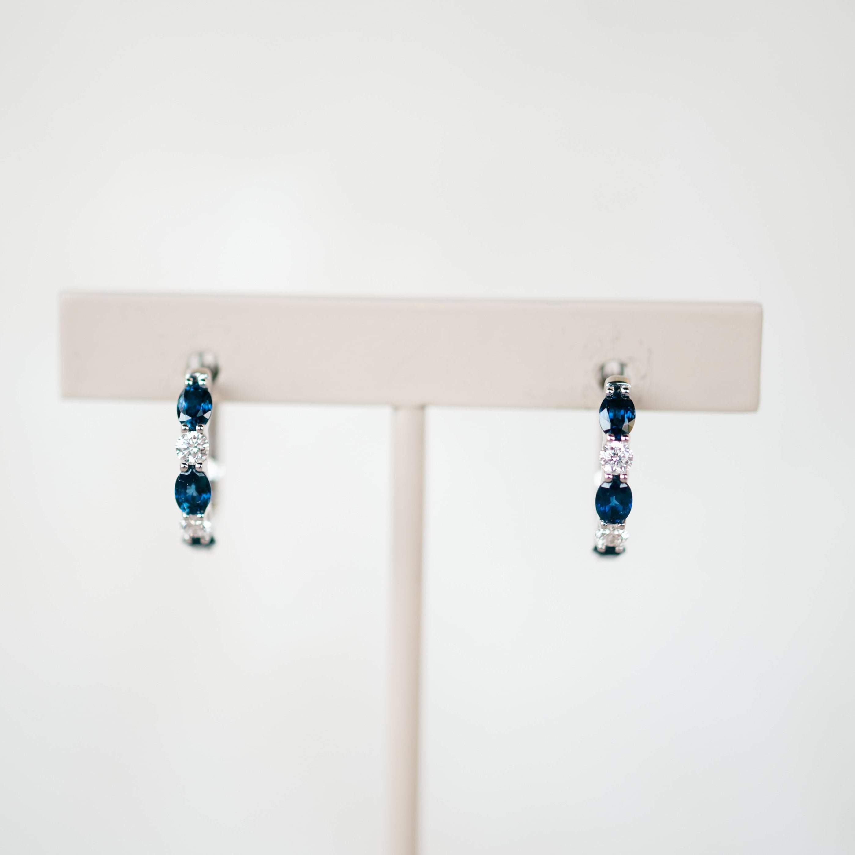 oval sapphire and diamond hoops