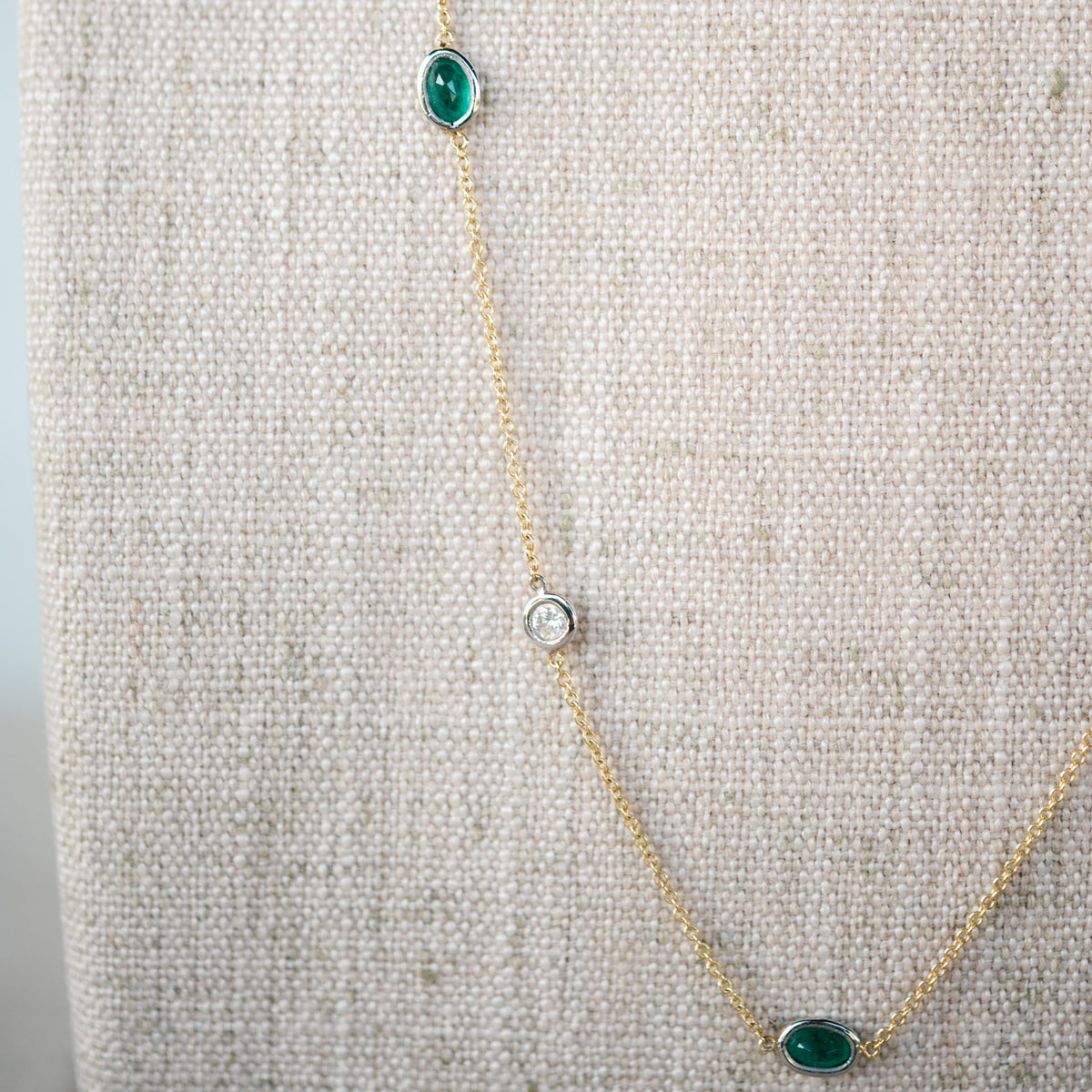 diamond and emerald station necklace