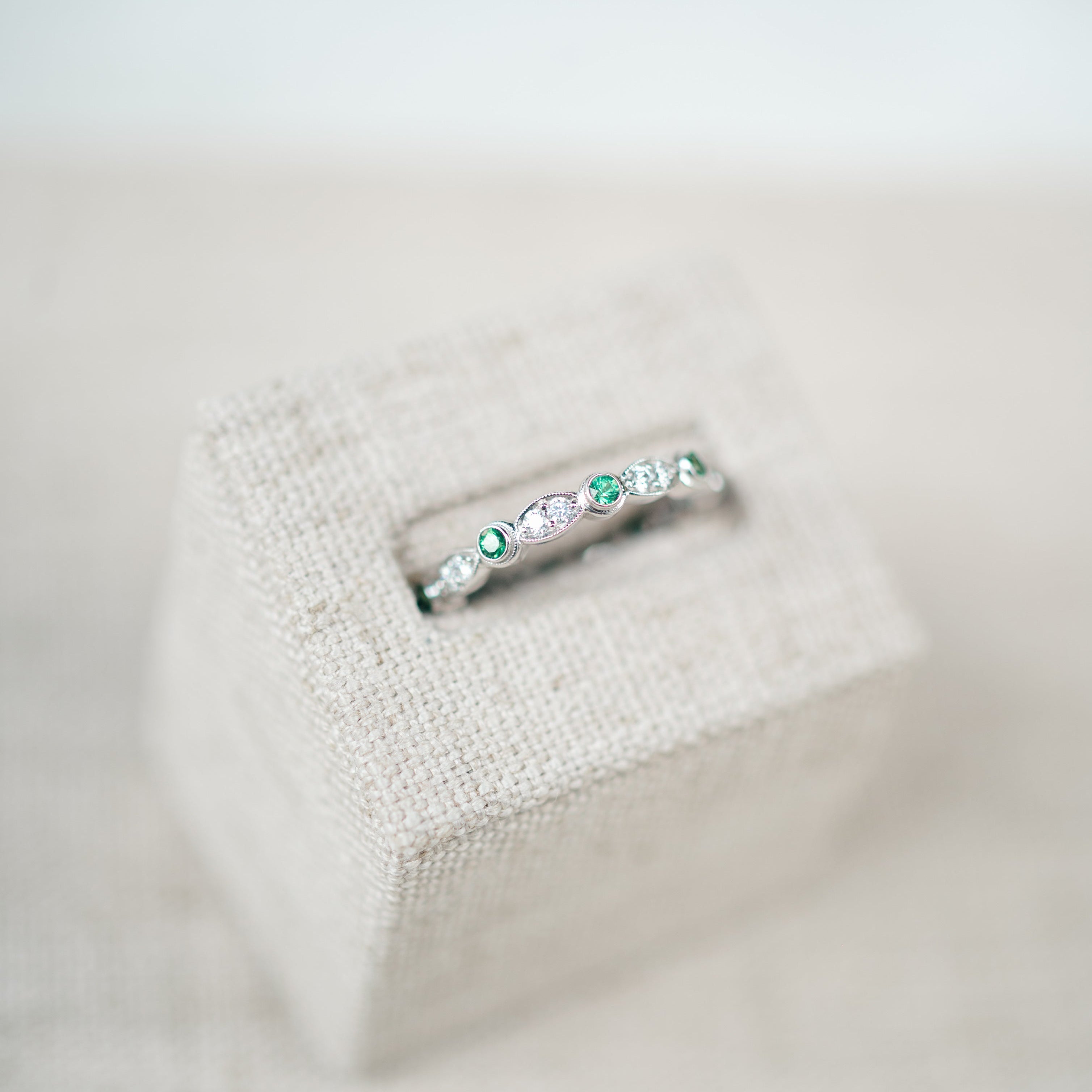 White Gold Diamond and Tsavorite Eternity Band