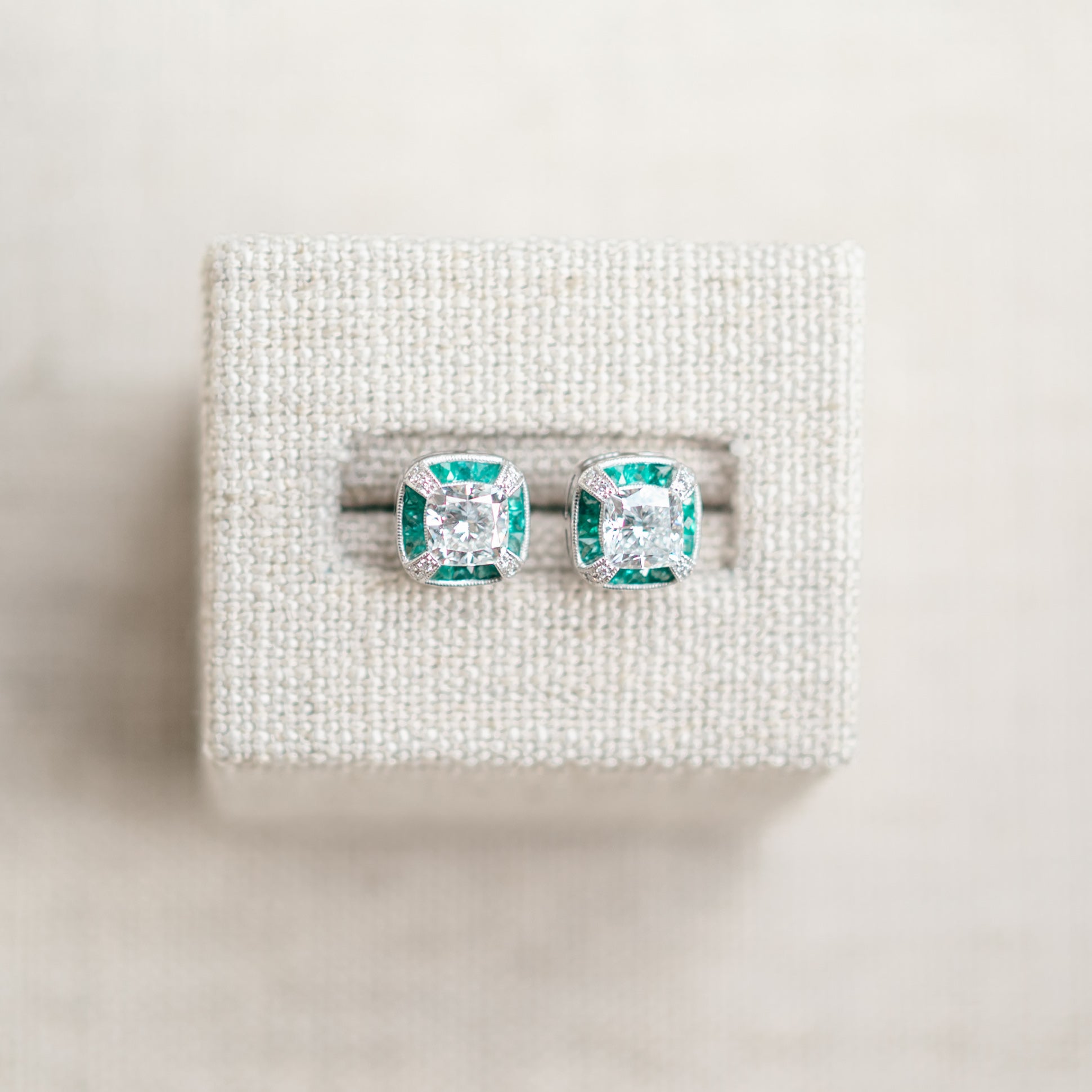 vintage inspired diamond and emerald halo earrings