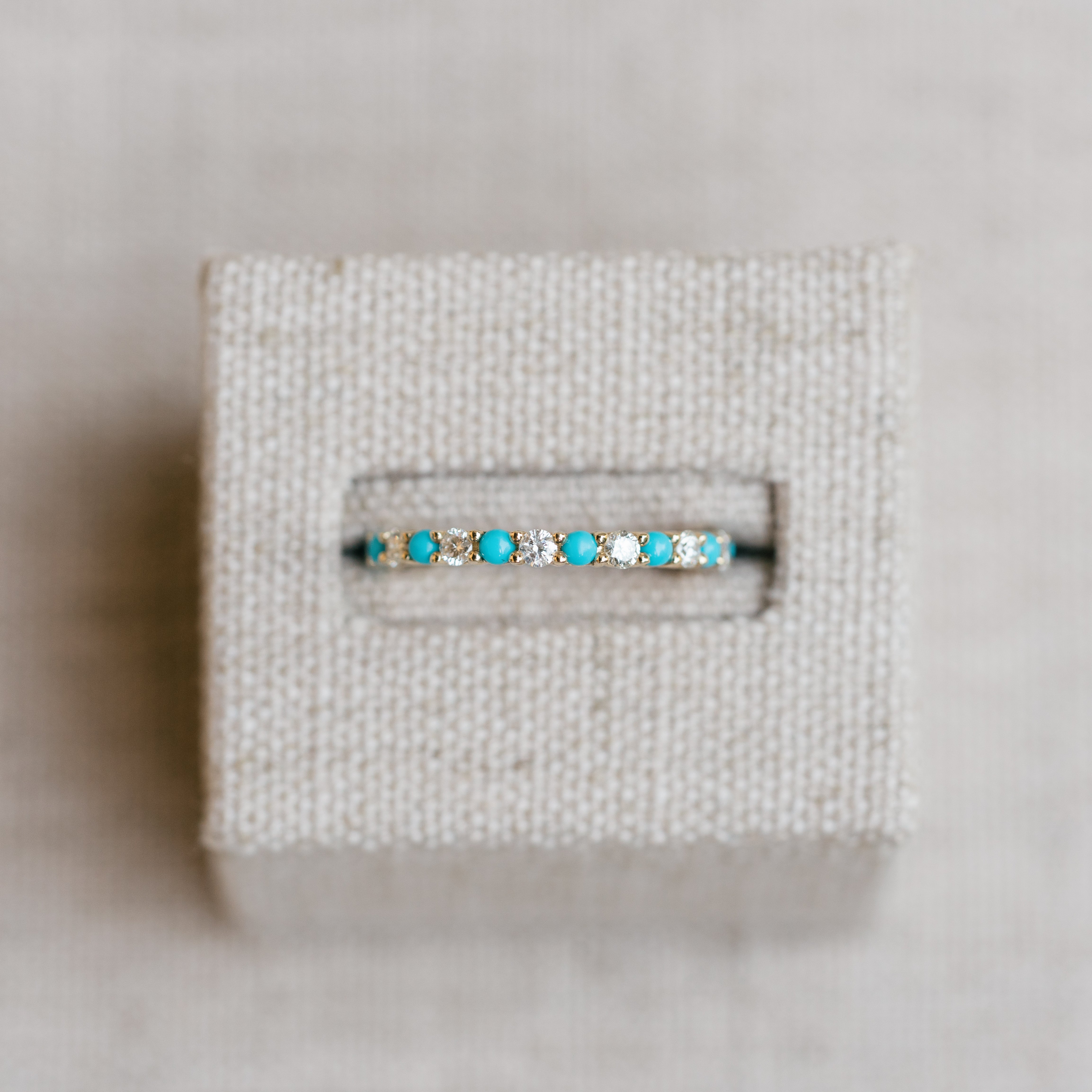 diamond and turquoise eternity band yellow gold