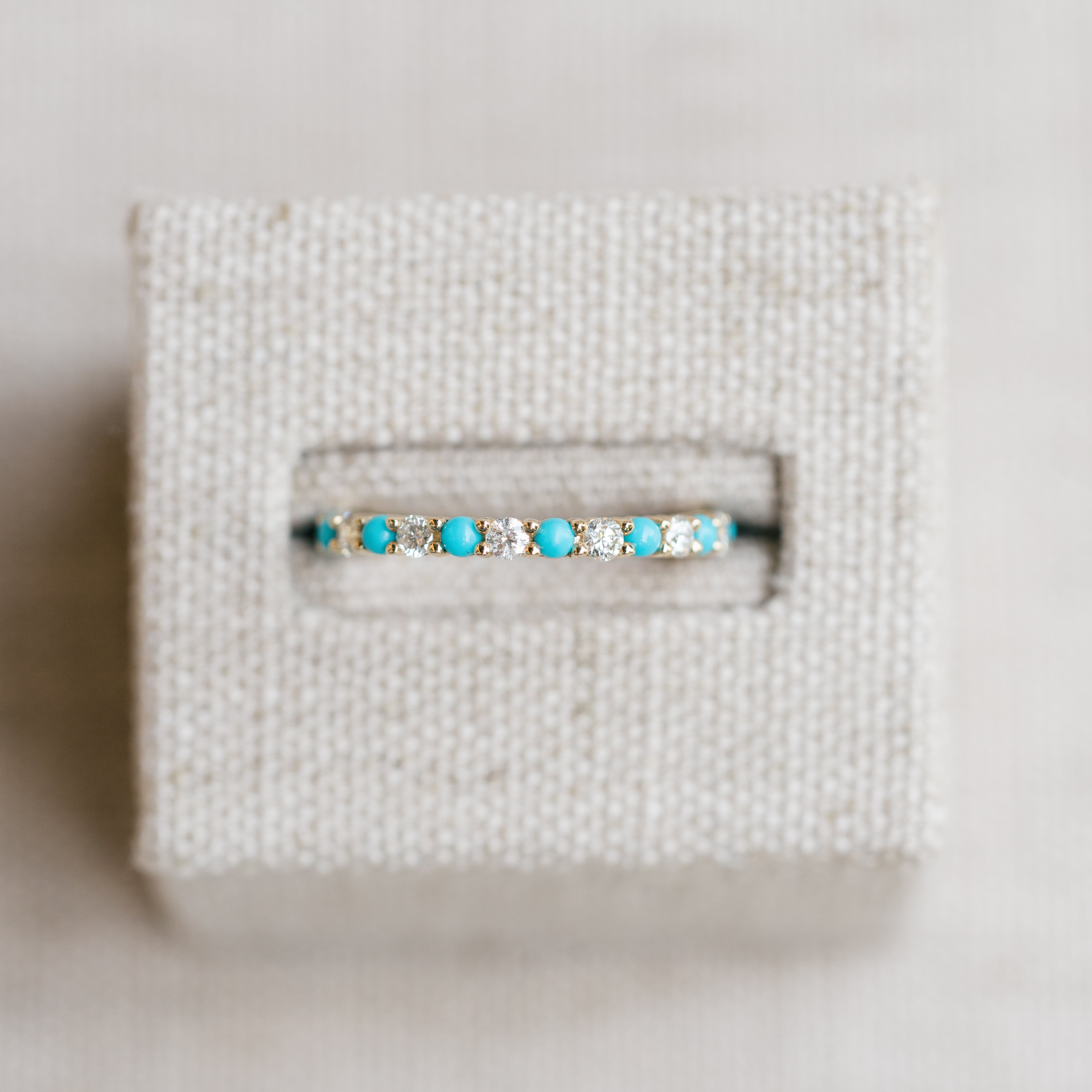 diamond and turquoise eternity band yellow gold