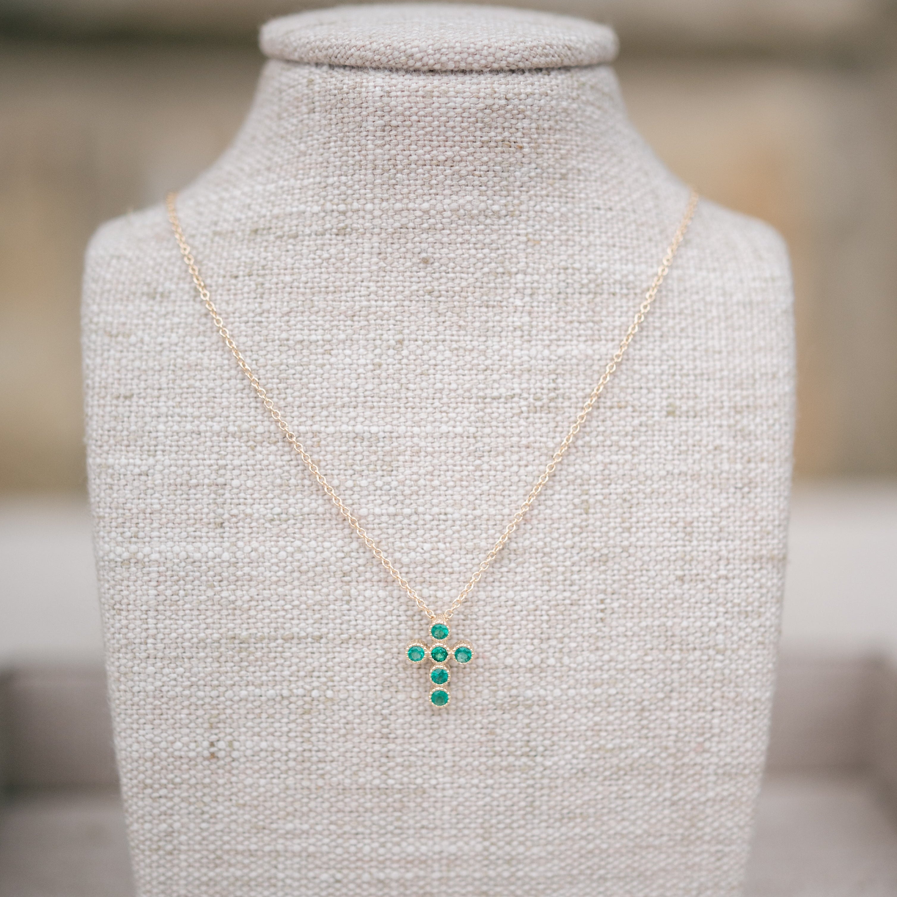 Emerald bezel cross