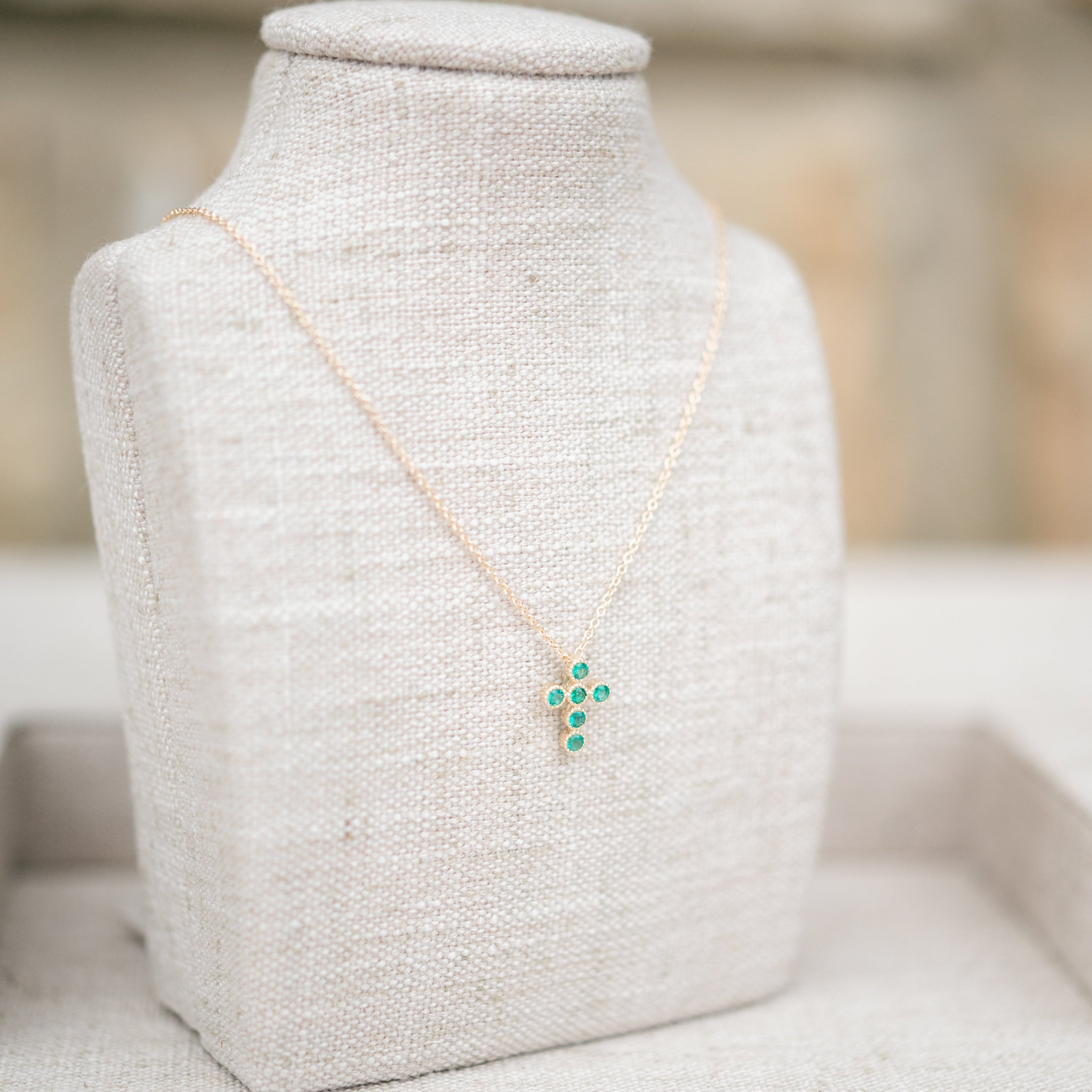 Emerald bezel cross