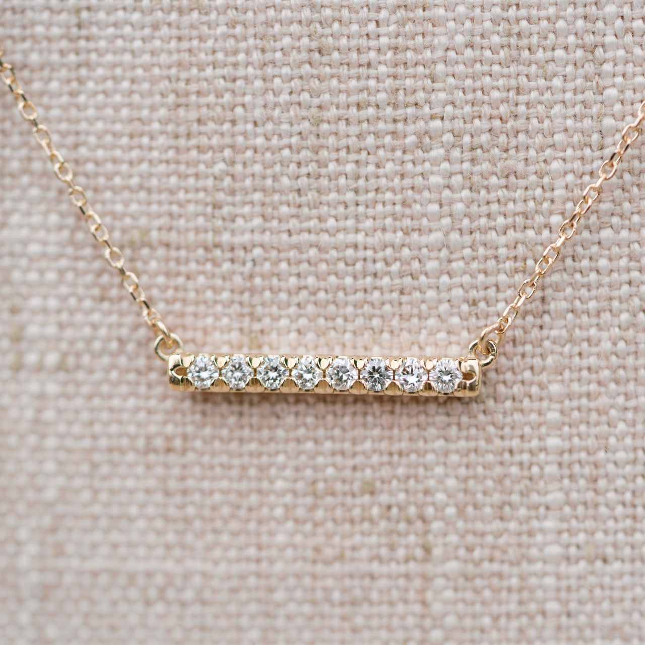 14k yellow gold diamond french set bar necklace