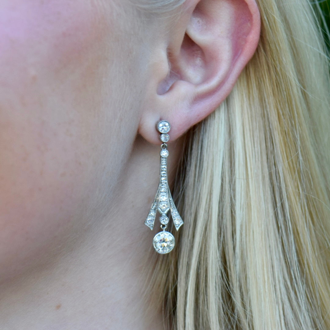 platinum diamond dangle earrings