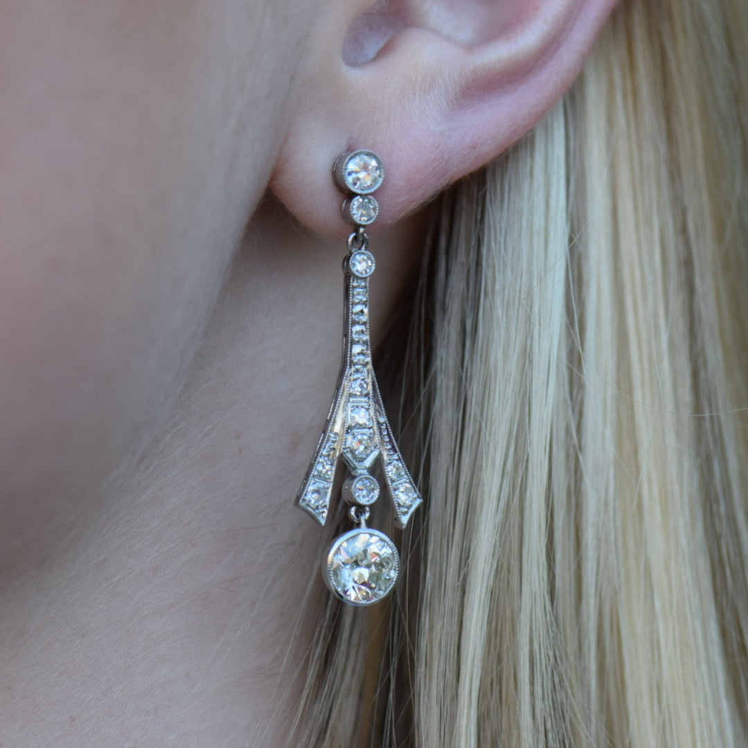 platinum diamond dangle earrings