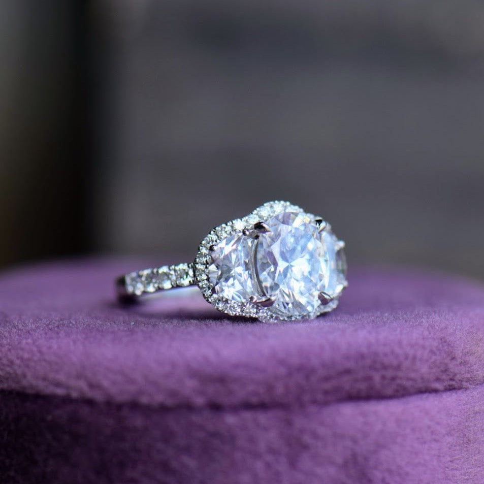 Platinum Three Stone Diamond Halo Ring