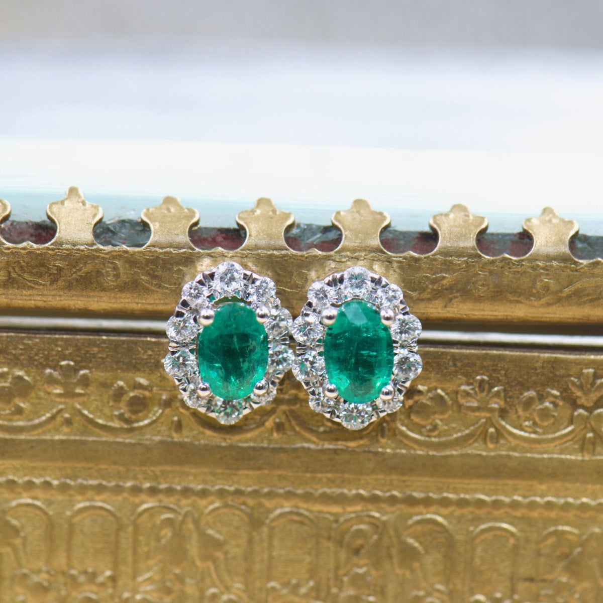 Oval Emerald and Diamond Halo Studs