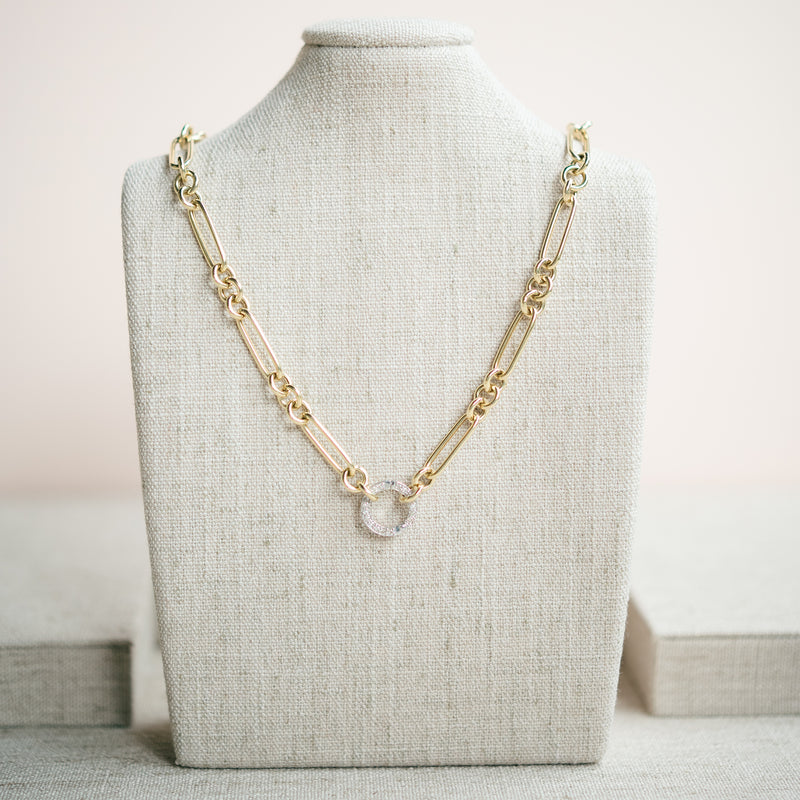 yellow gold figaro necklace with diamond connector