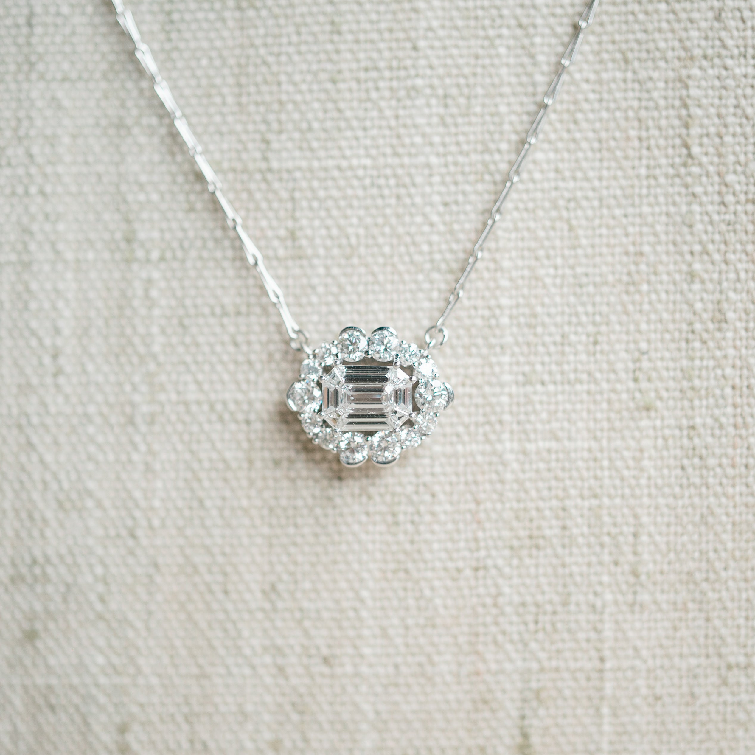 emerald diamond halo necklace