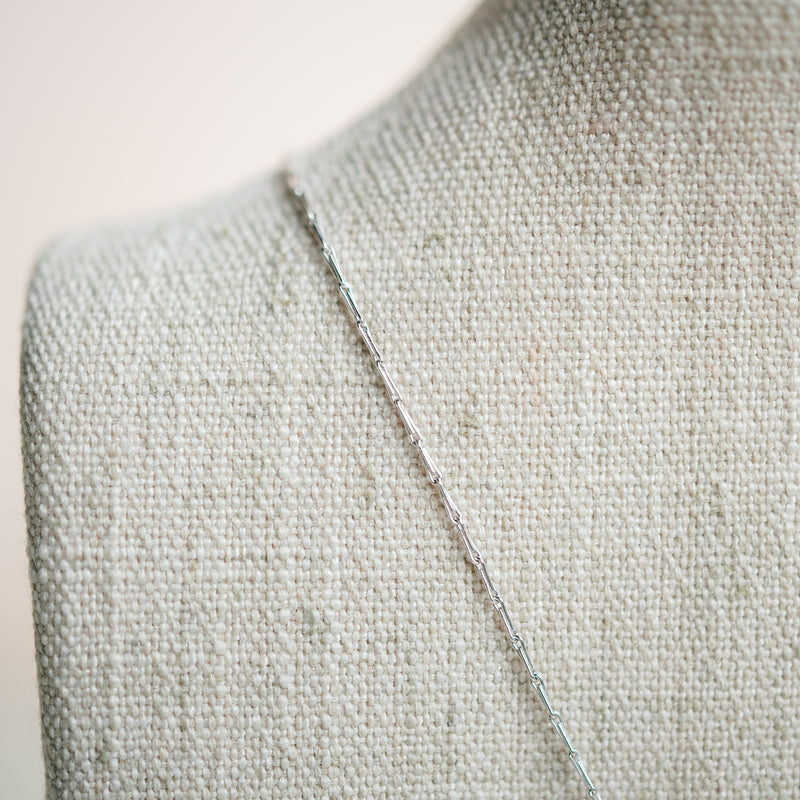 emerald cut diamond with diamond halo necklace