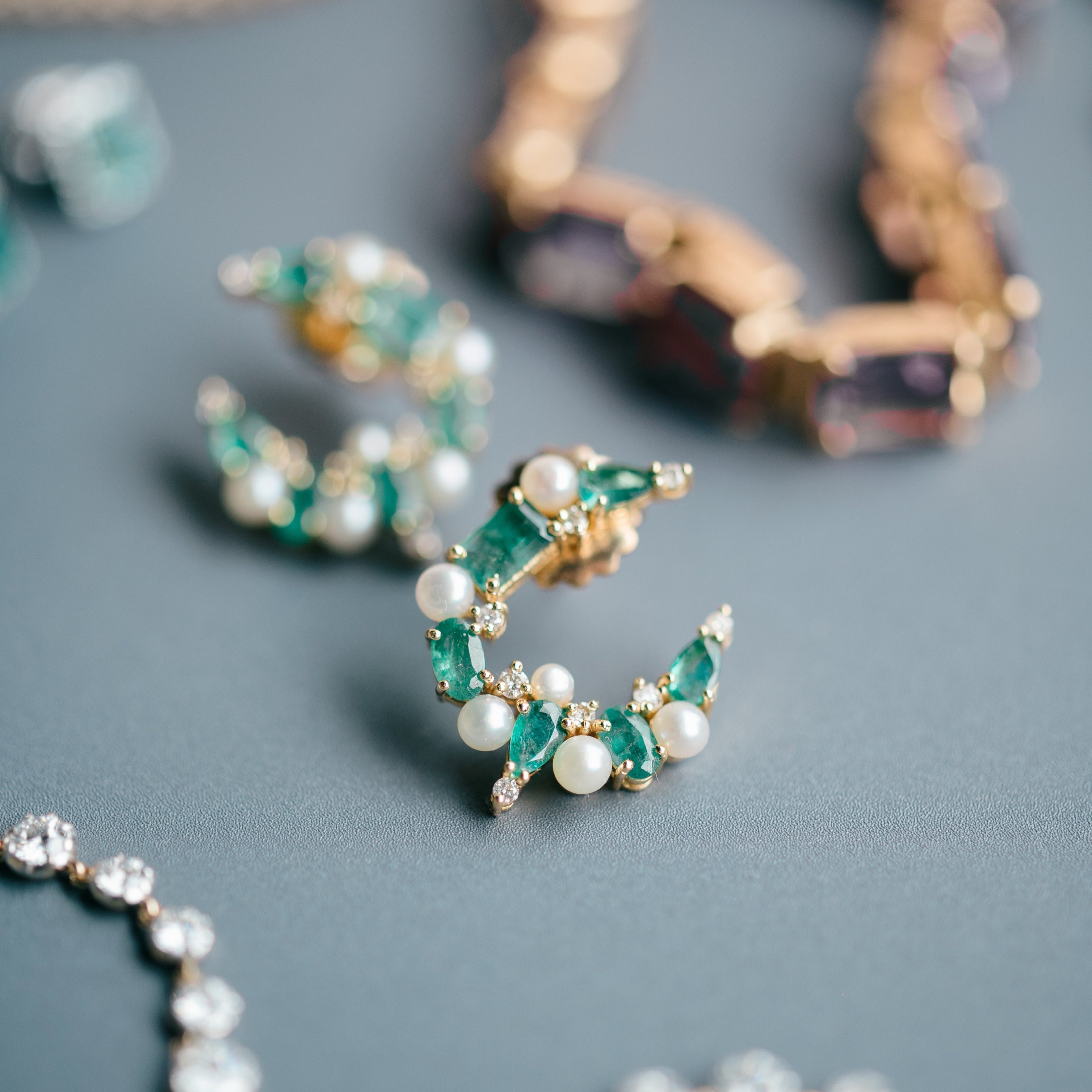 emerald and pearl crescent earrings