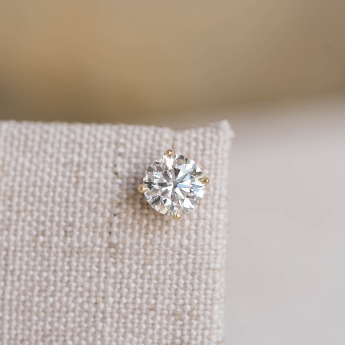 diamond studs, yellow gold