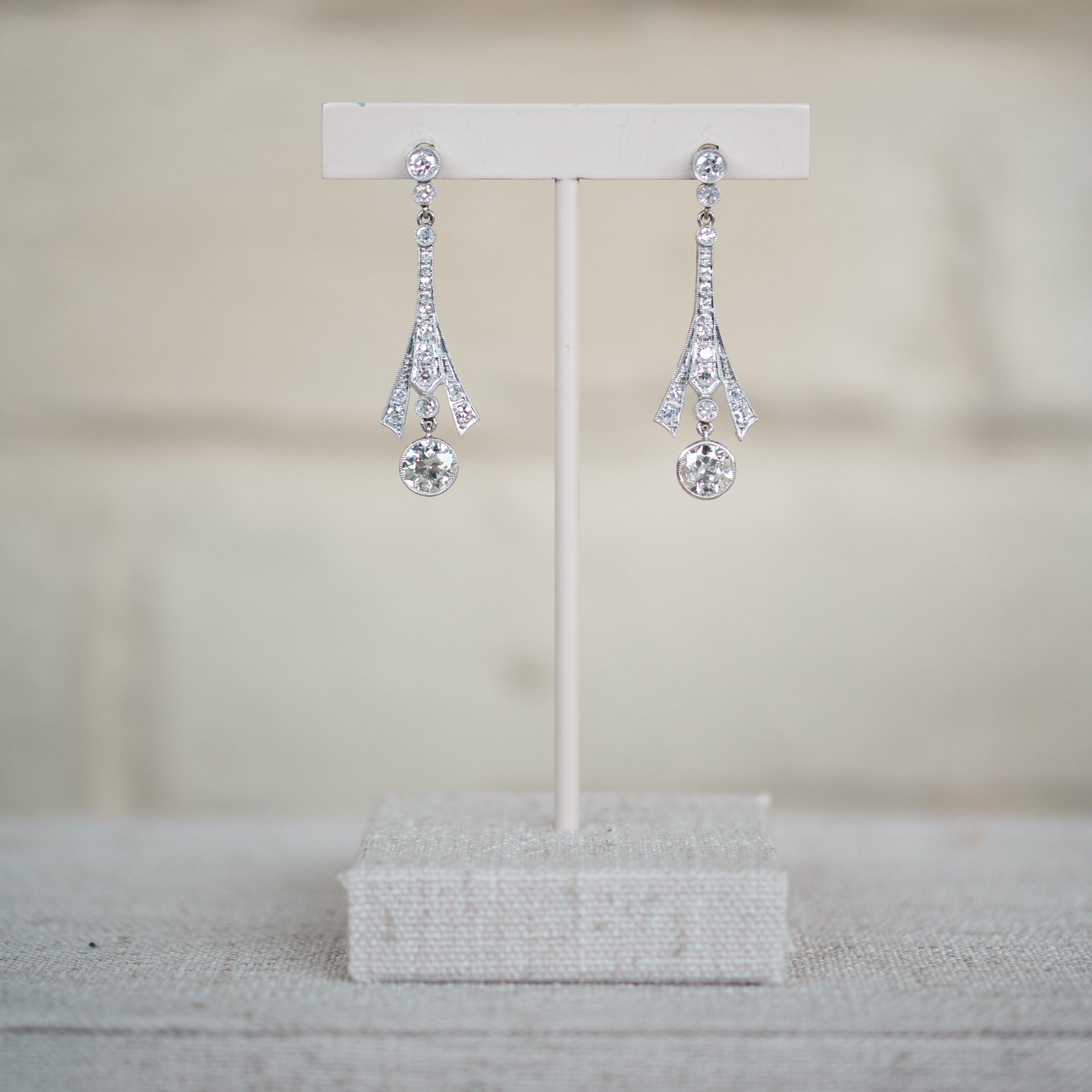 platinum diamond dangle earrings