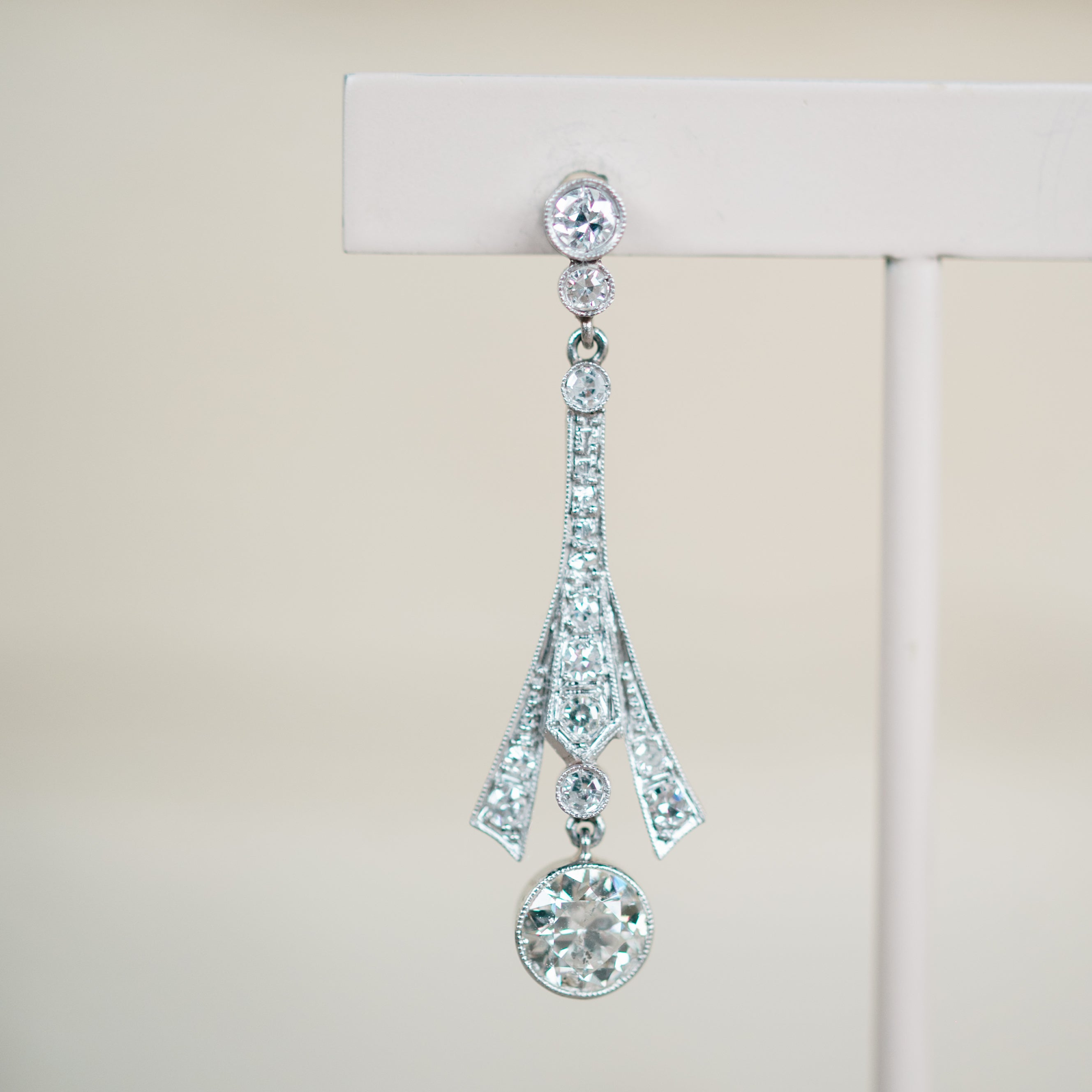 platinum diamond dangle earrings