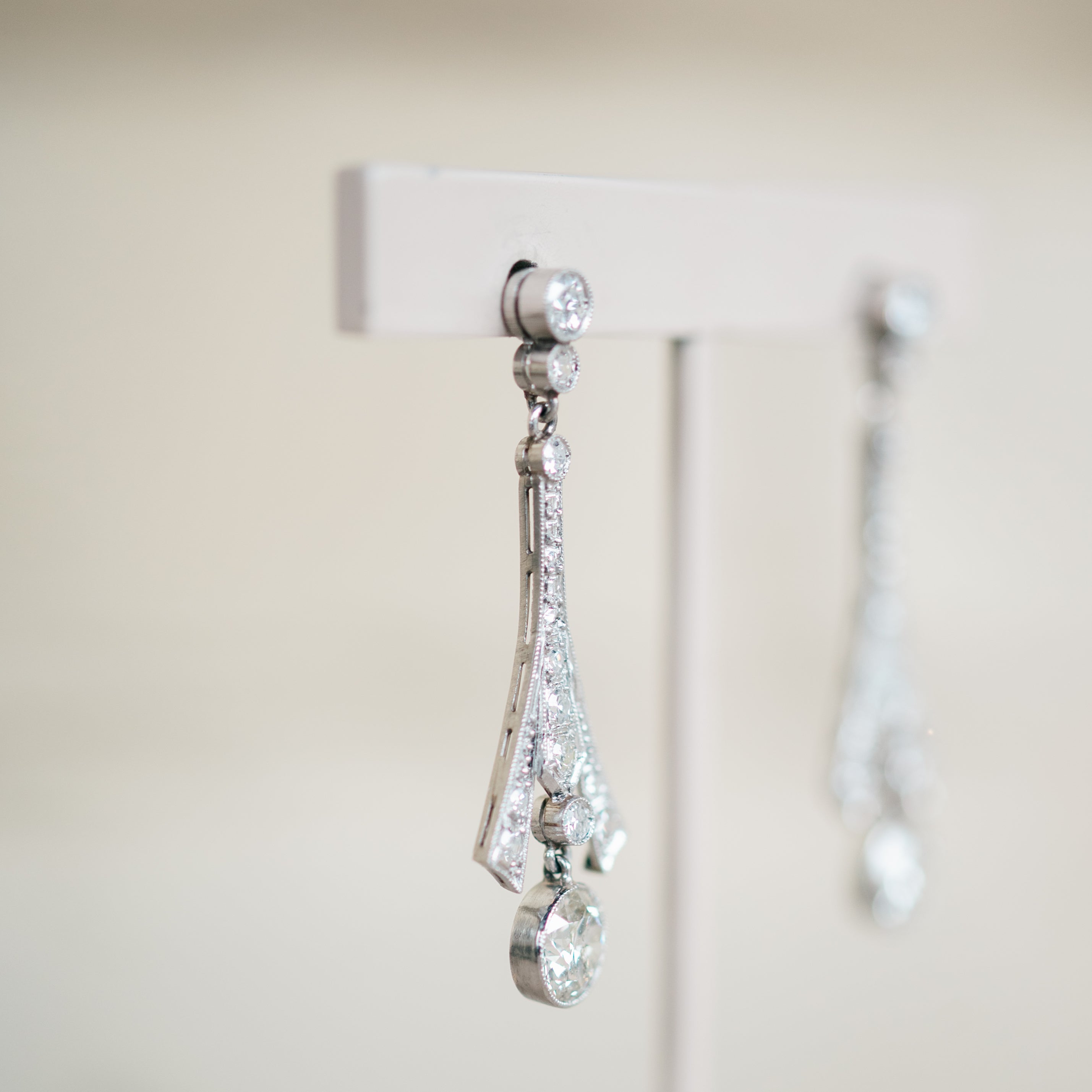 platinum diamond dangle earrings