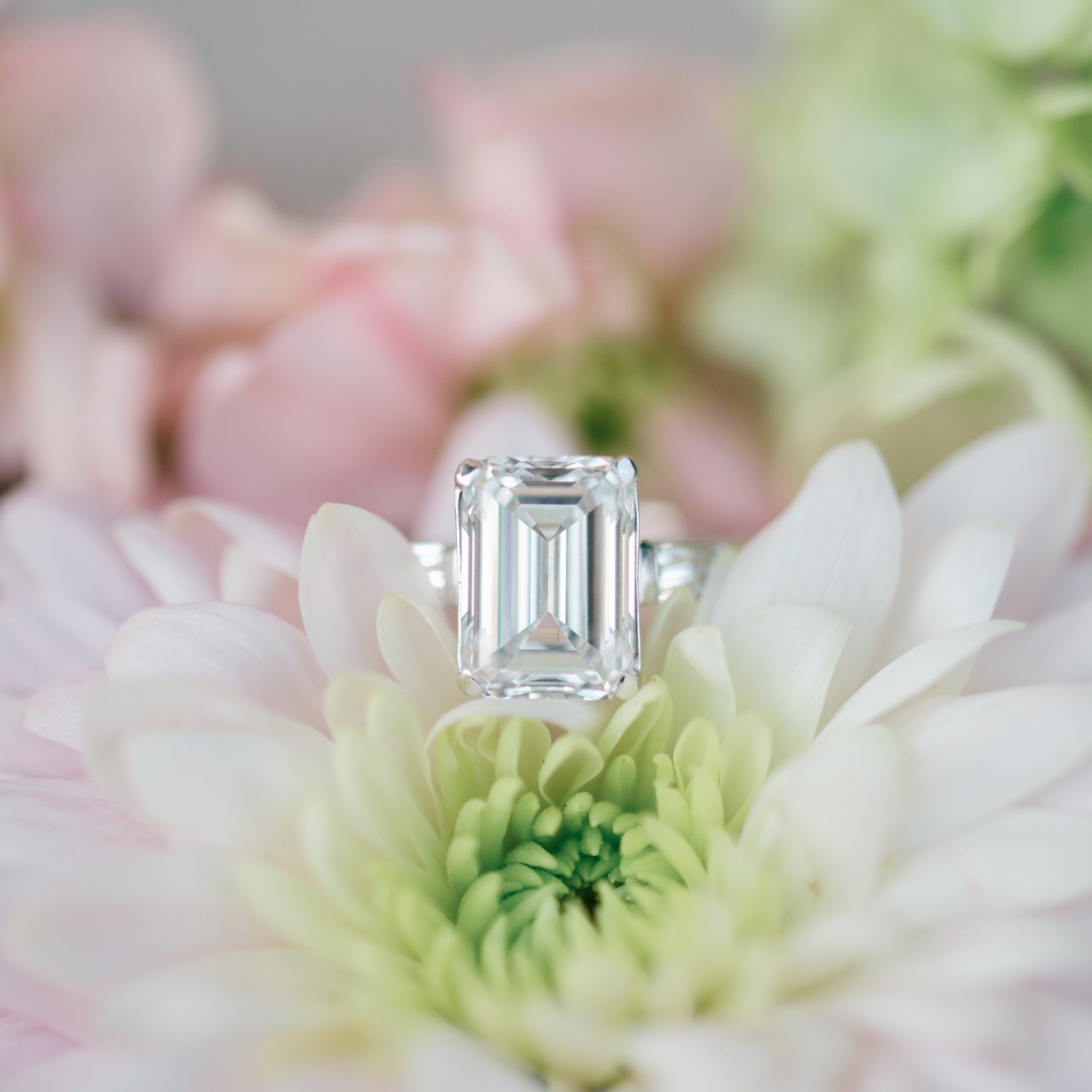 emerald cut diamond and baguette  ring