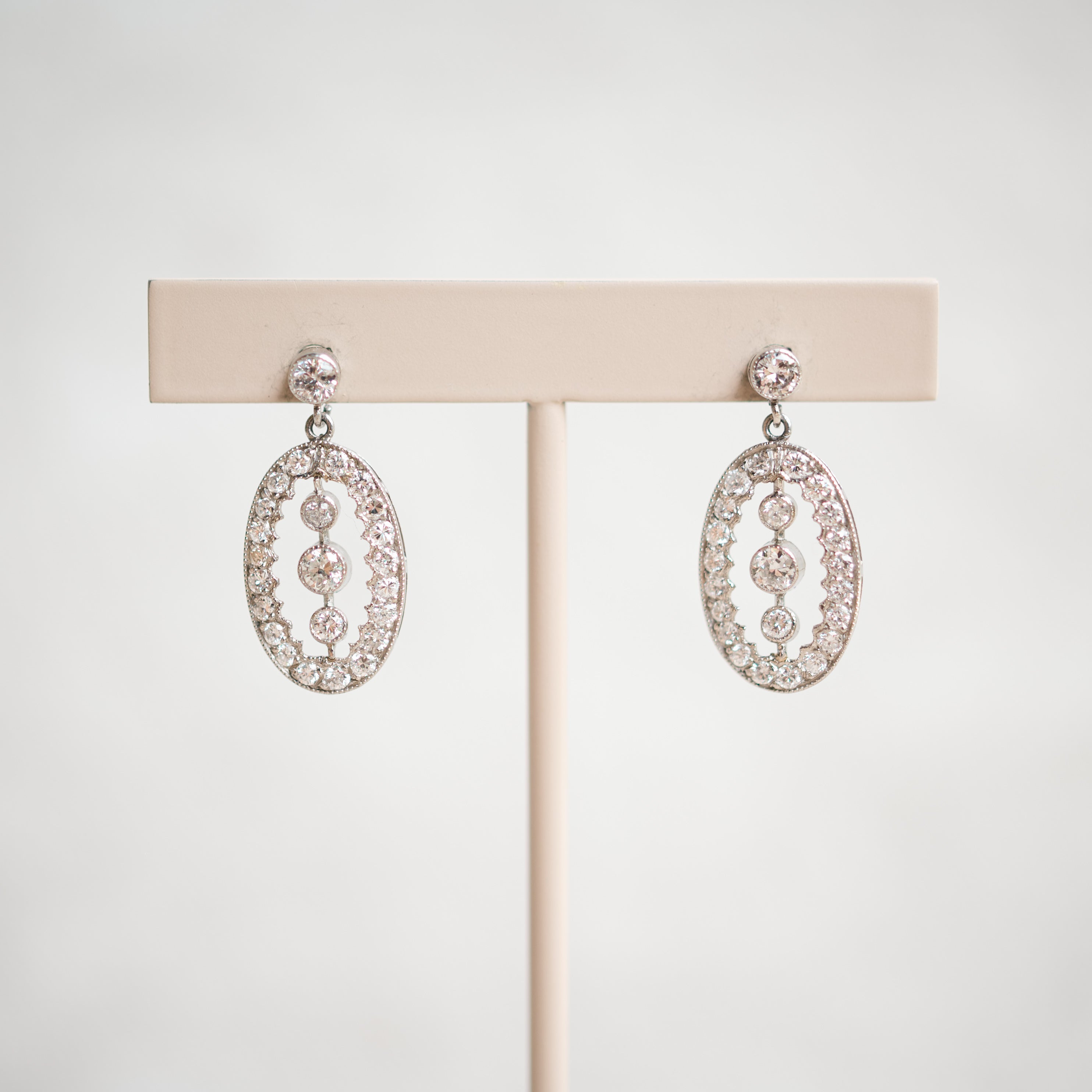 platinum diamond dangle earrings