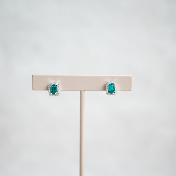 emerald cut emerald and diamond stud earrings