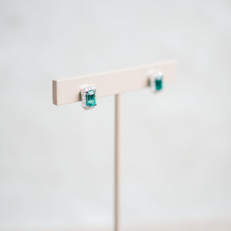 emerald cut emerald and diamond stud earrings