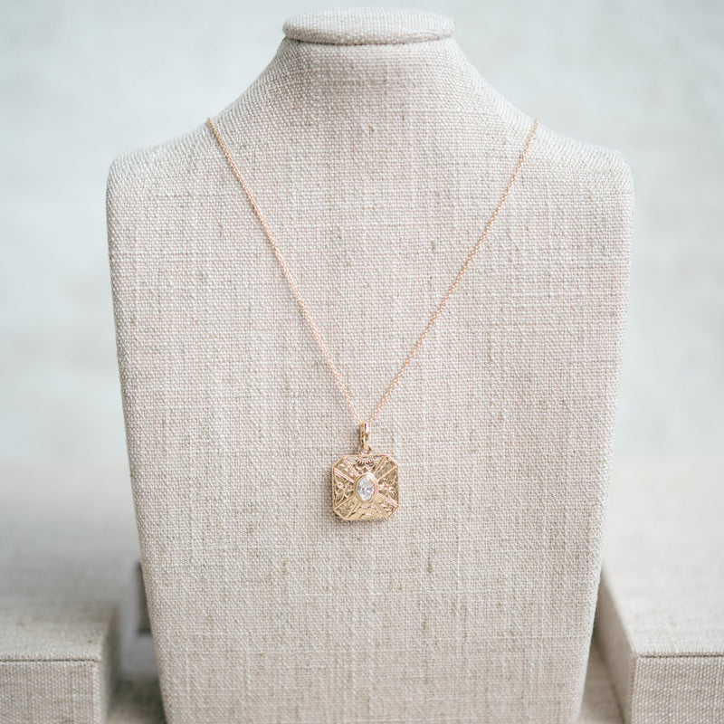 oval diamond engraved pendant