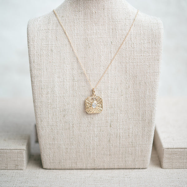 oval diamond engraved pendant