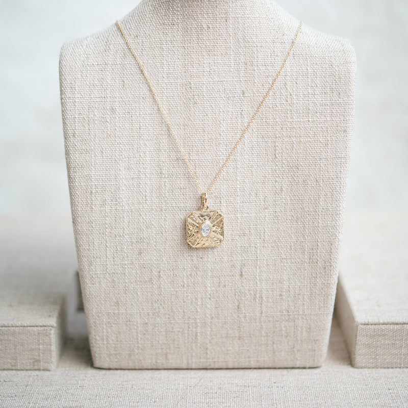 oval diamond engraved pendant