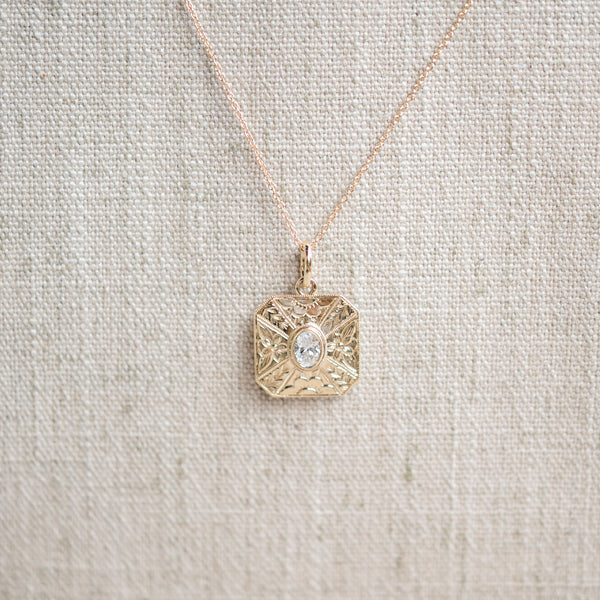 oval diamond engraved pendant
