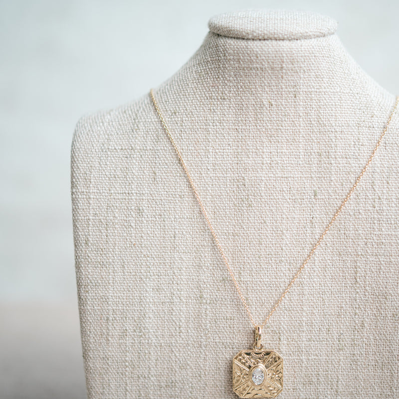oval diamond engraved pendant