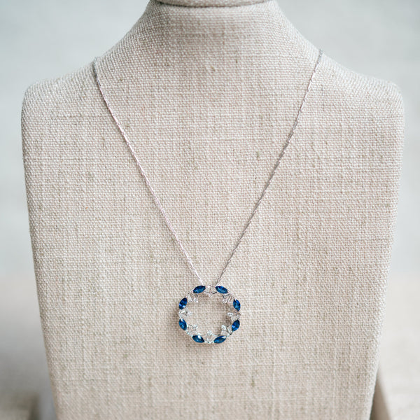 blue sapphire and diamond circle pendant