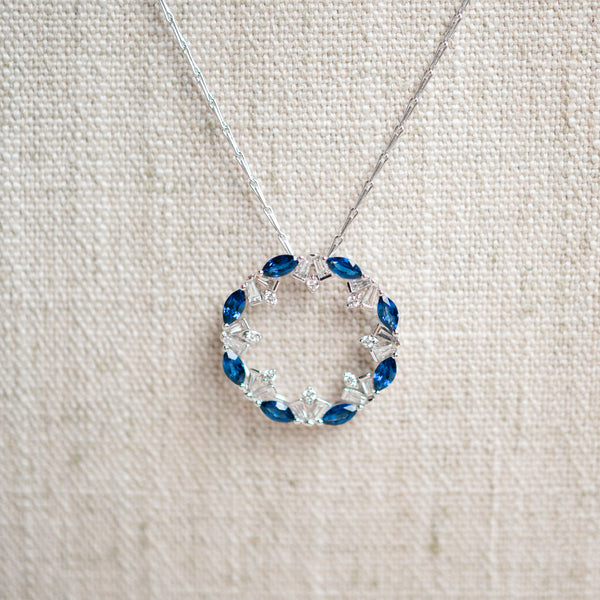 blue sapphire and diamond circle pendant