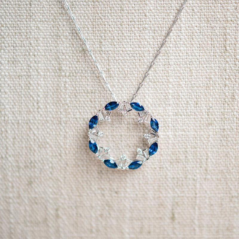 blue sapphire and diamond circle pendant