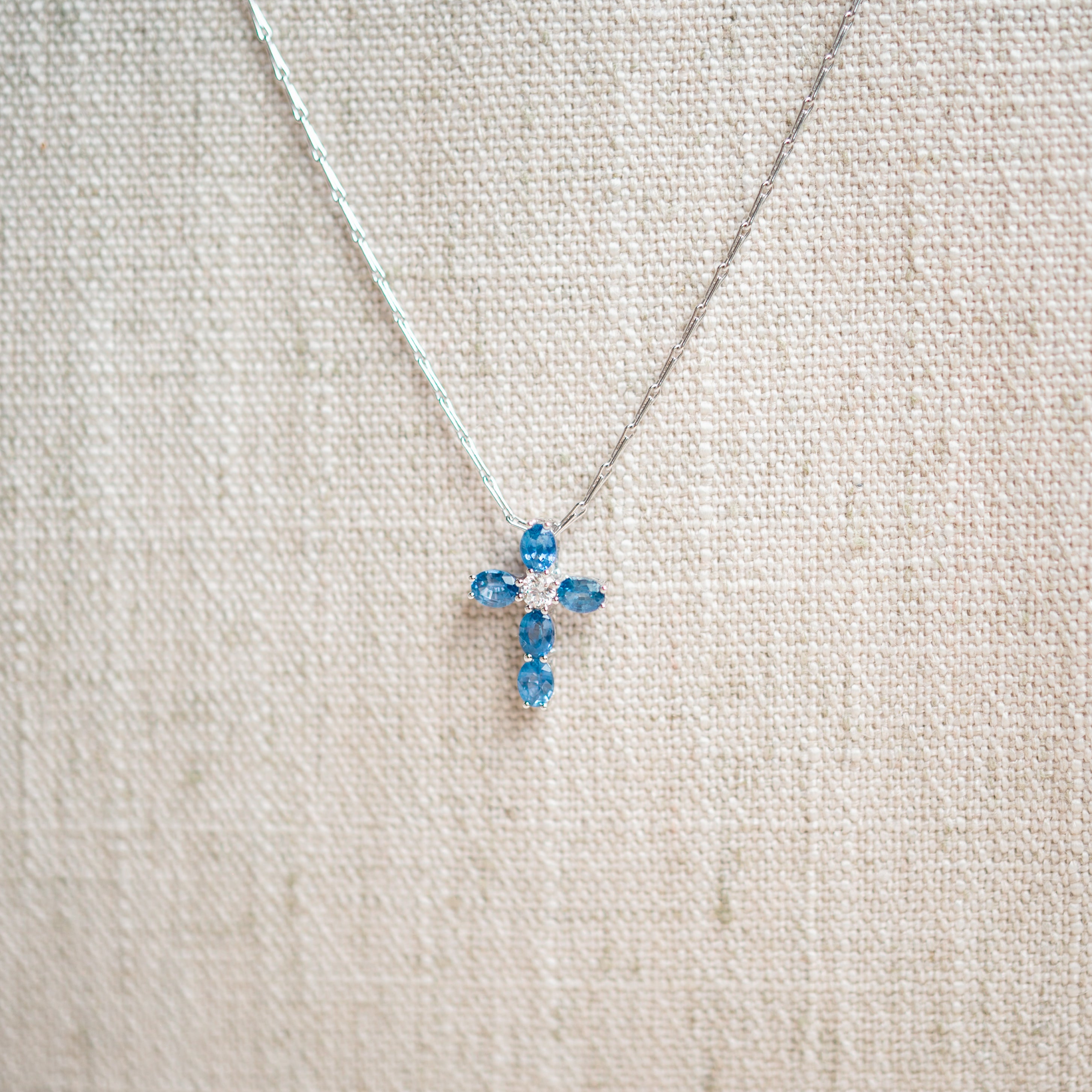 blue sapphire and diamond cross