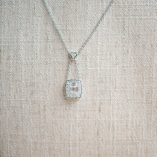 emerald cut diamond and scalloped diamond halo necklace