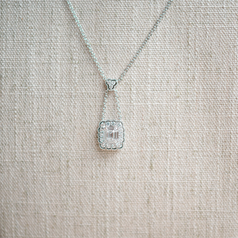 emerald cut diamond and scalloped diamond halo necklace