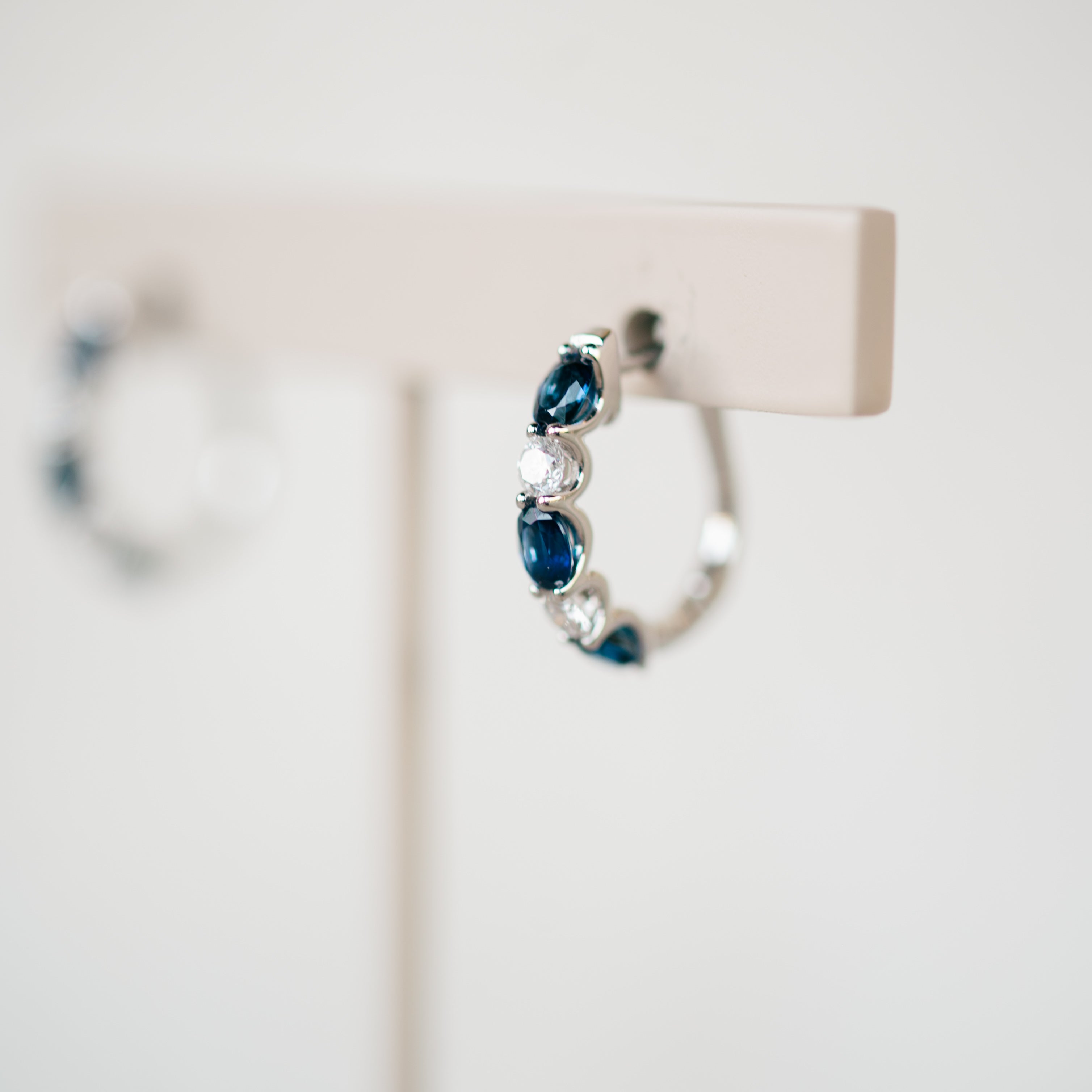oval sapphire and diamond hoops