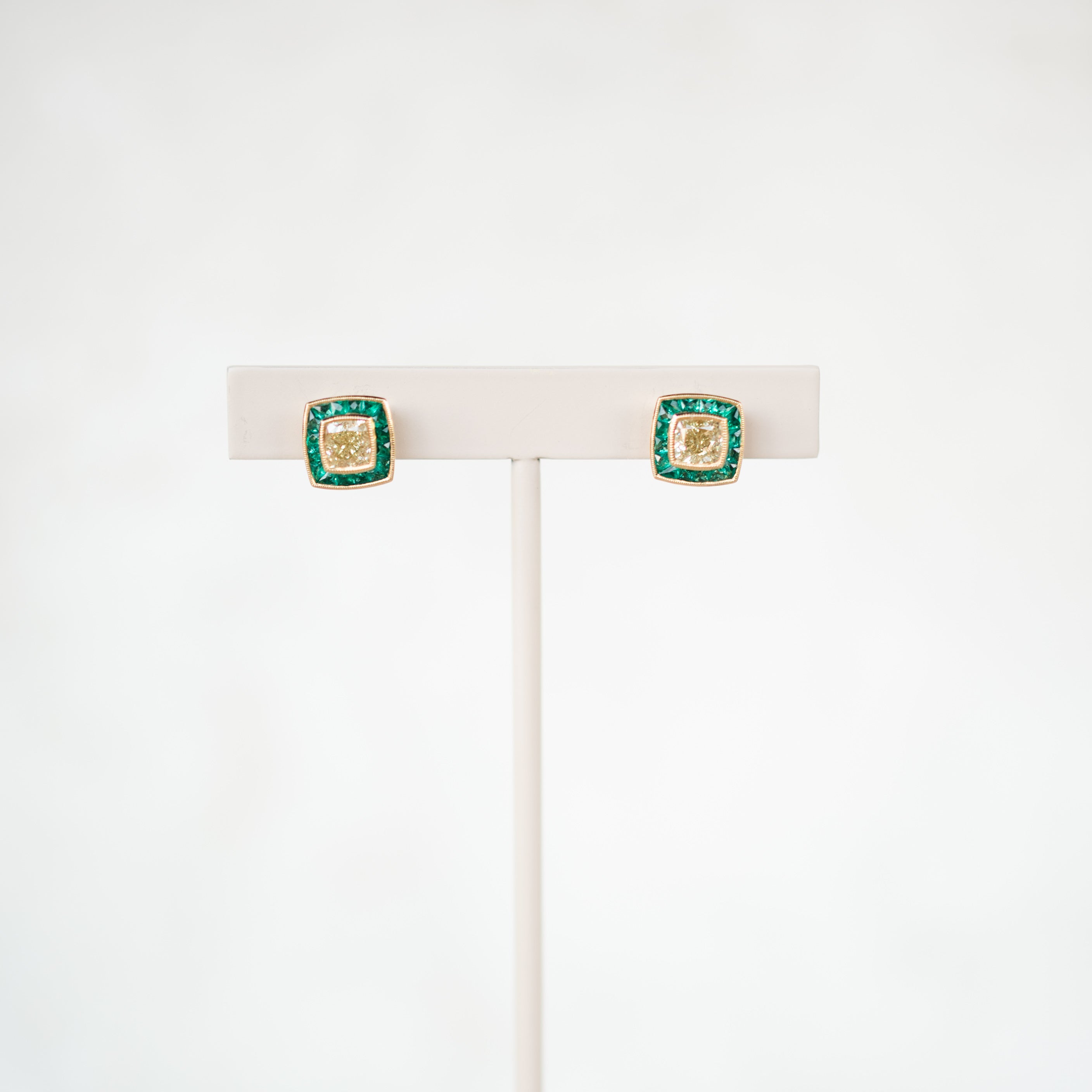 Yellow Diamond and Emerald Halo Earrings