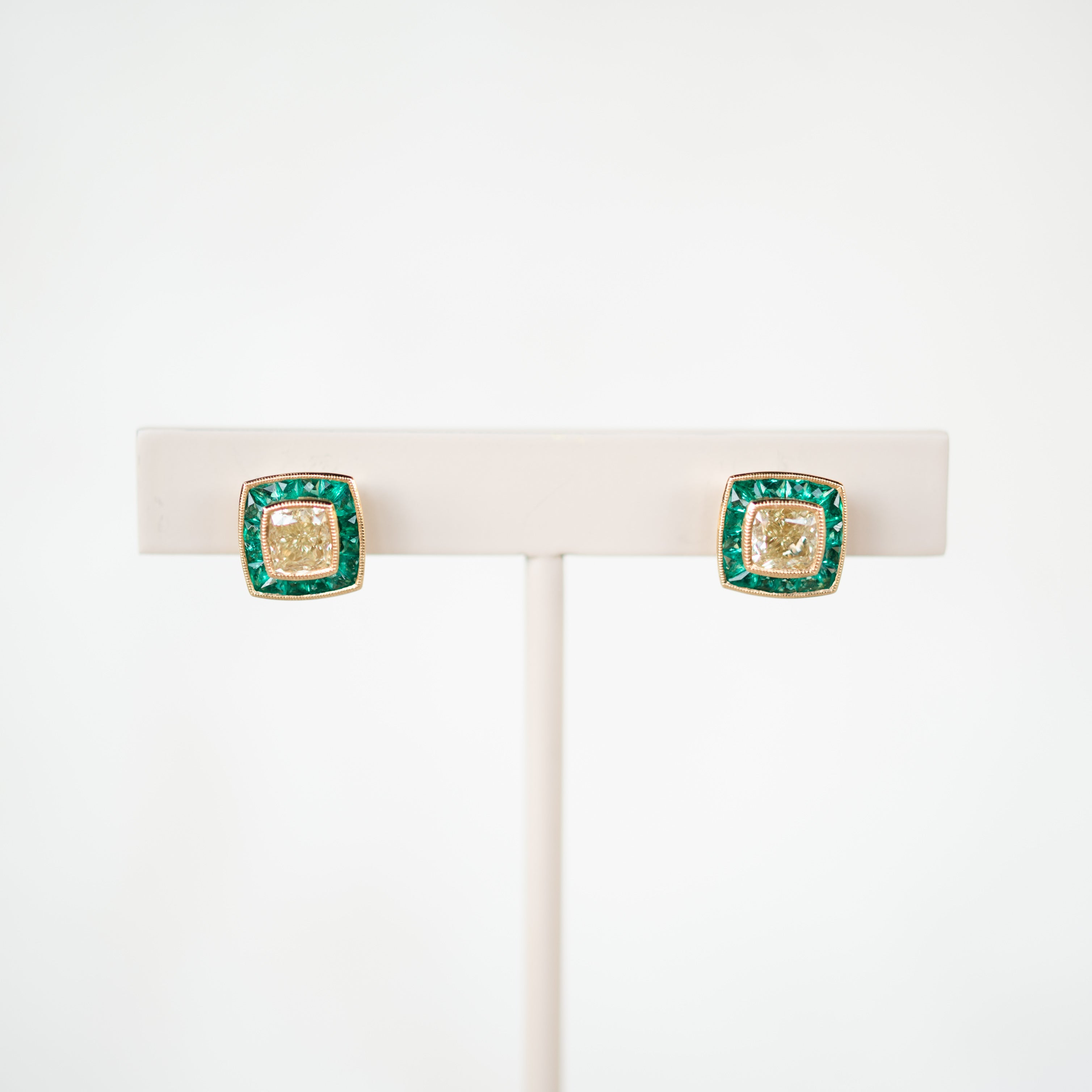 Yellow Diamond and Emerald Halo Earrings