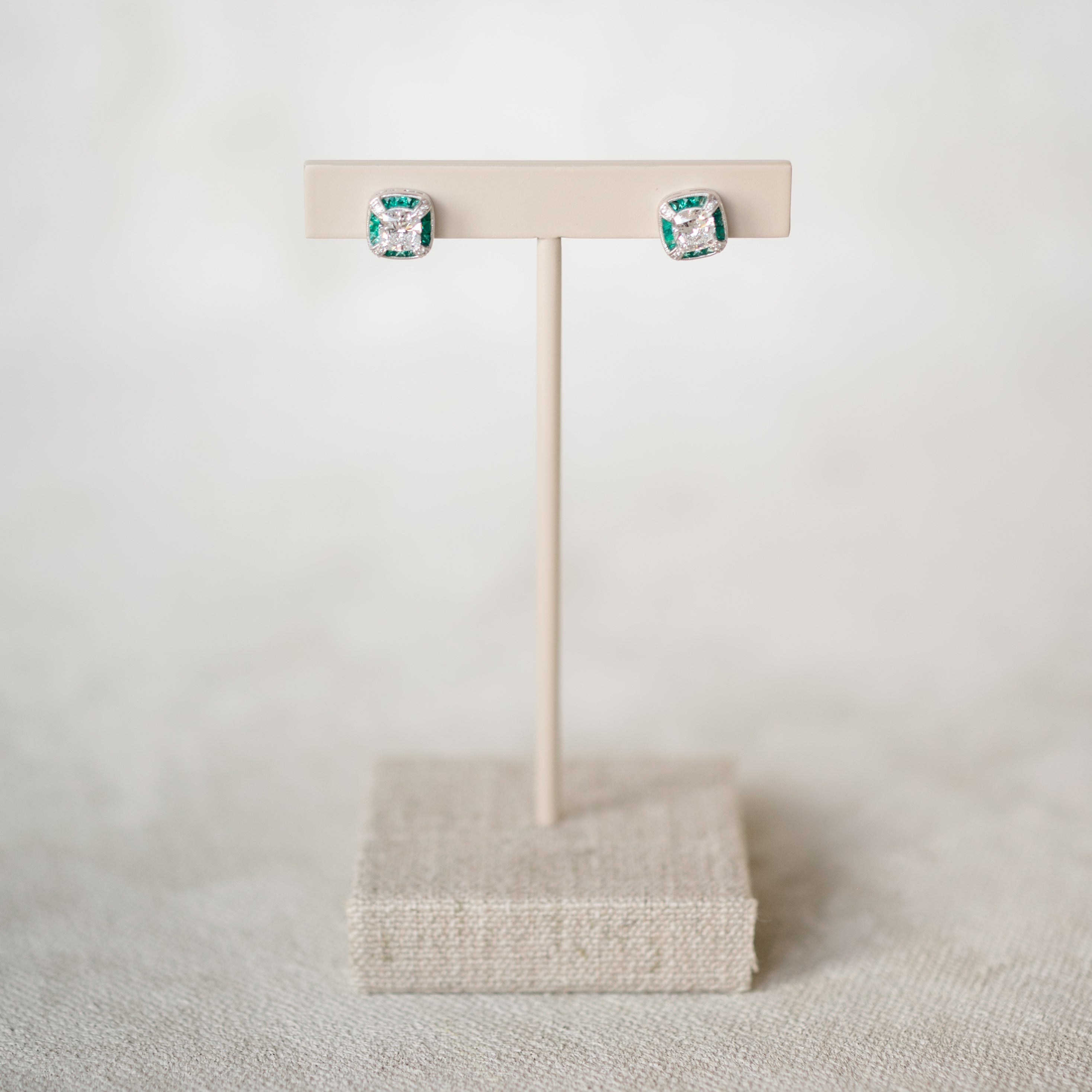 vintage inspired diamond and emerald halo earrings