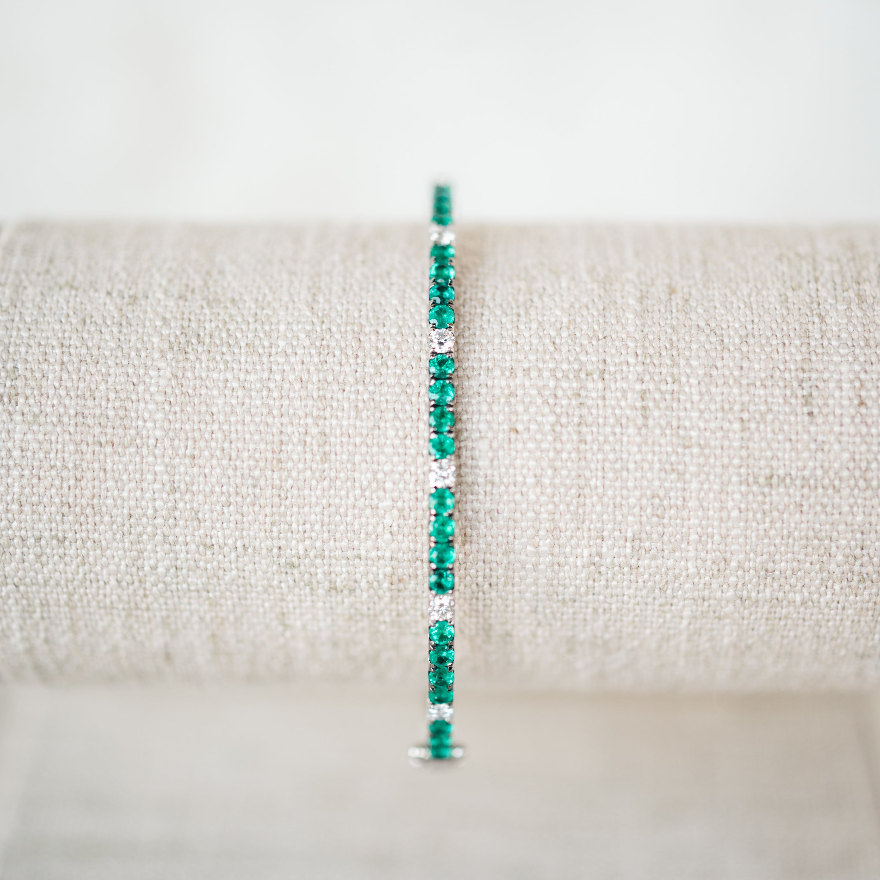 White Gold Diamond and Emerald Bangle