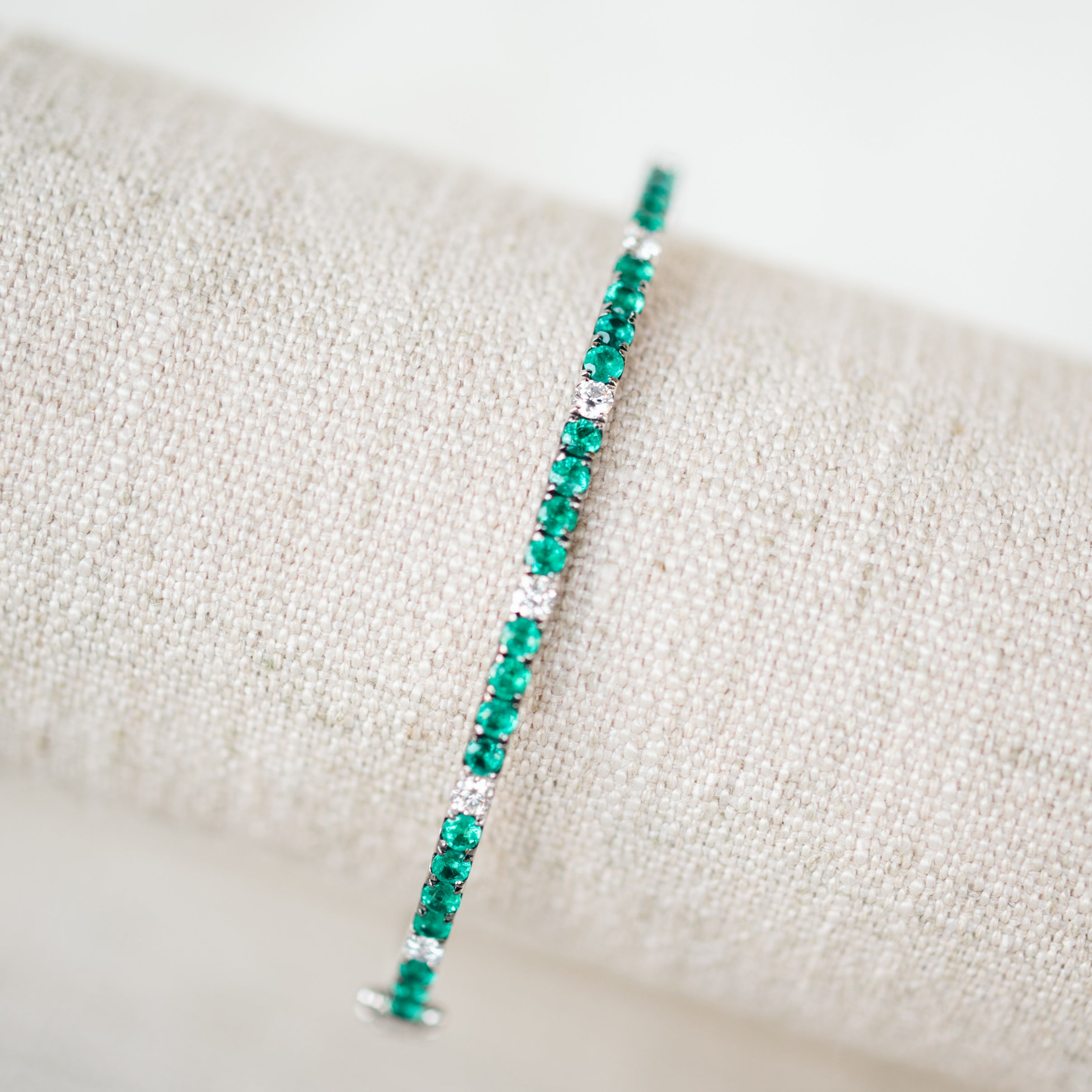 White Gold Diamond and Emerald Bangle