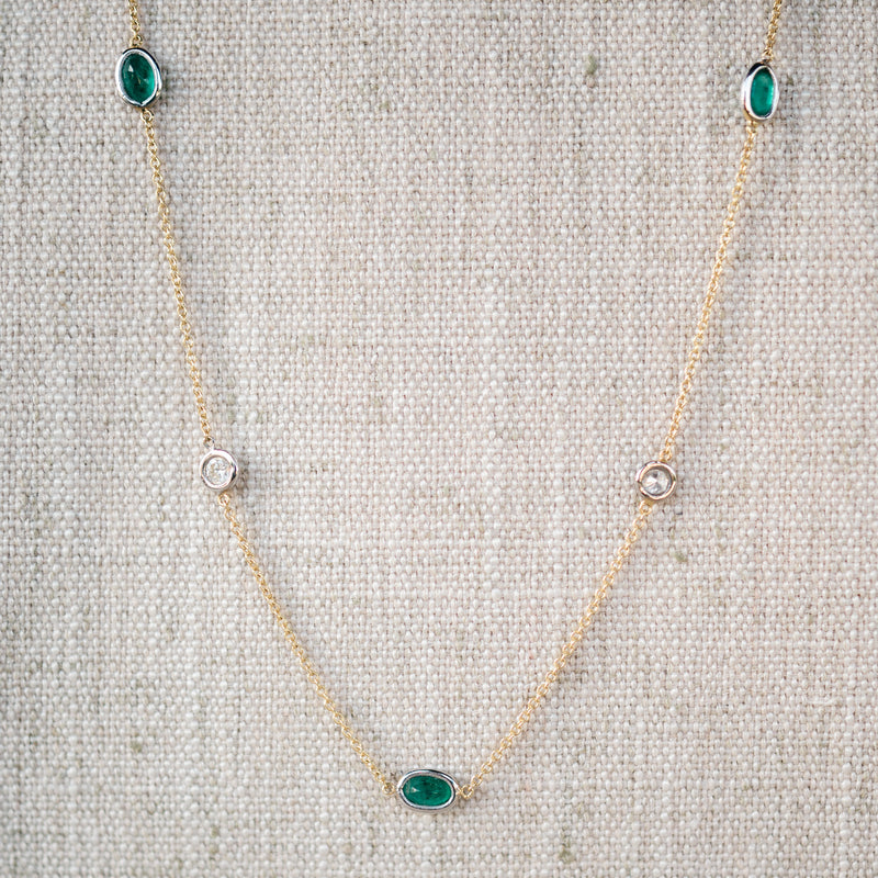 diamond and emerald station necklace