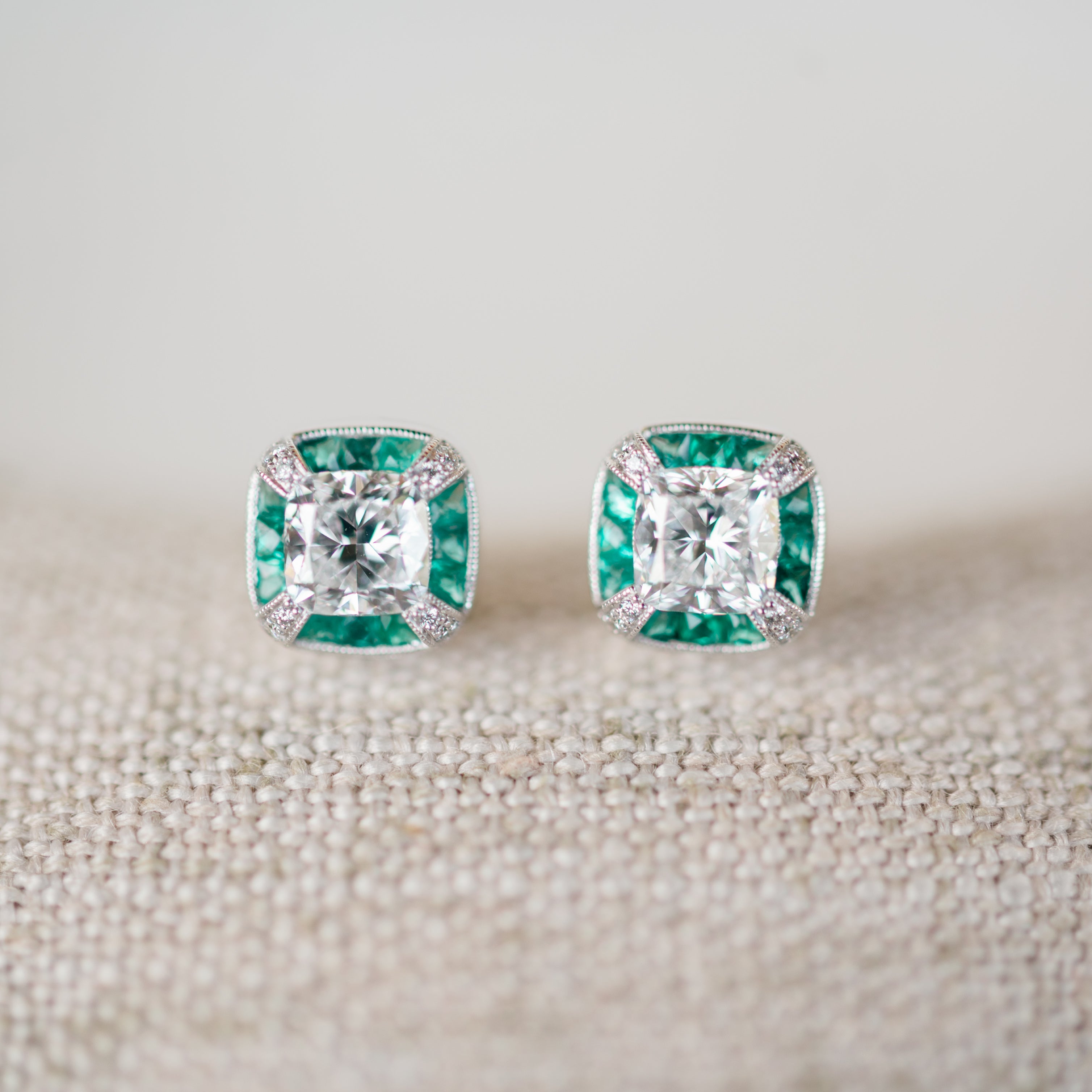vintage inspired diamond and emerald halo earrings