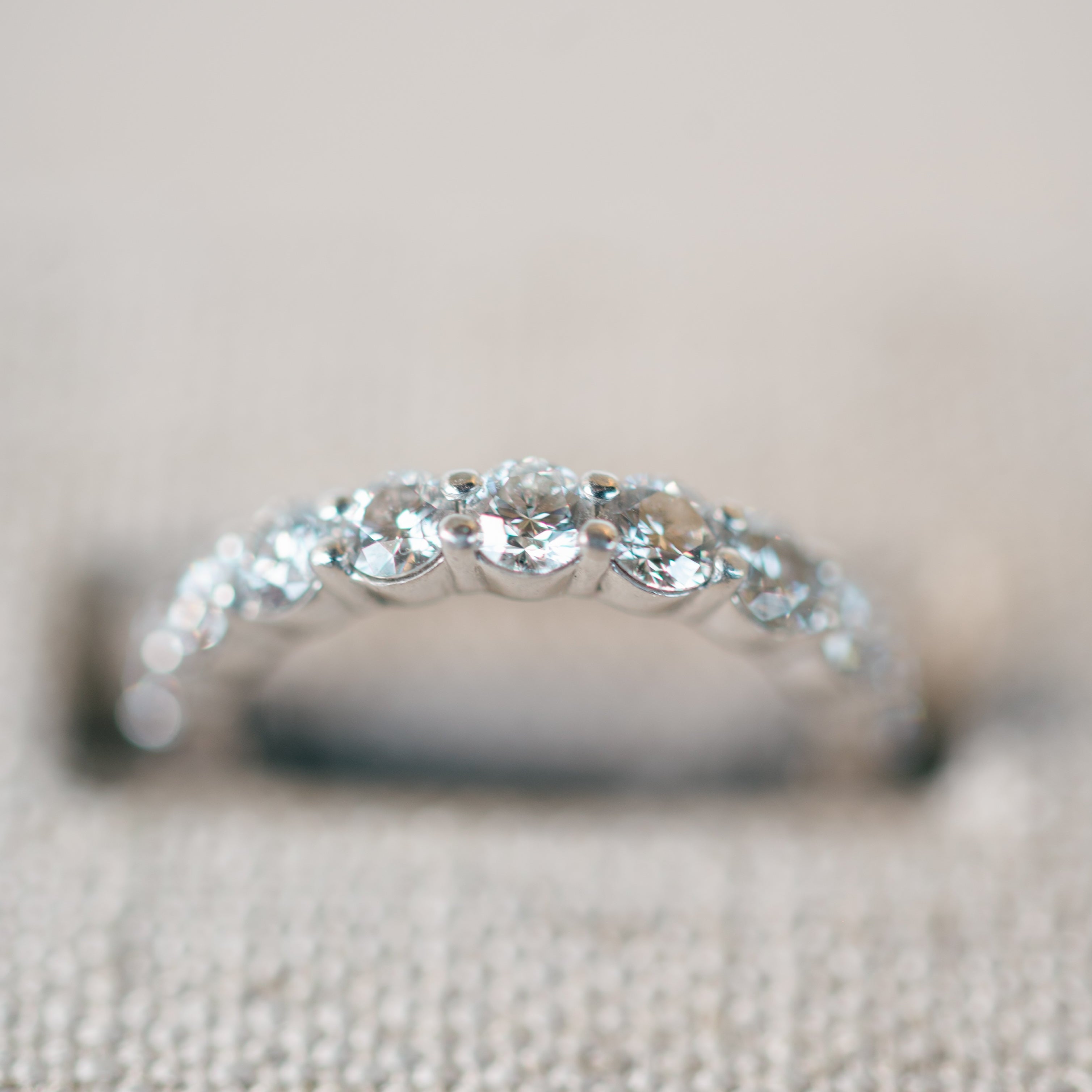 shared prong diamond eternity band