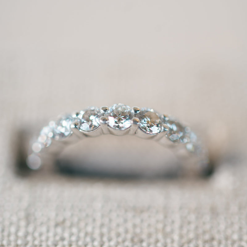 shared prong diamond eternity band