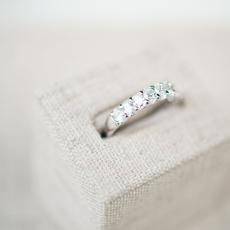 oval diamond half eternity band