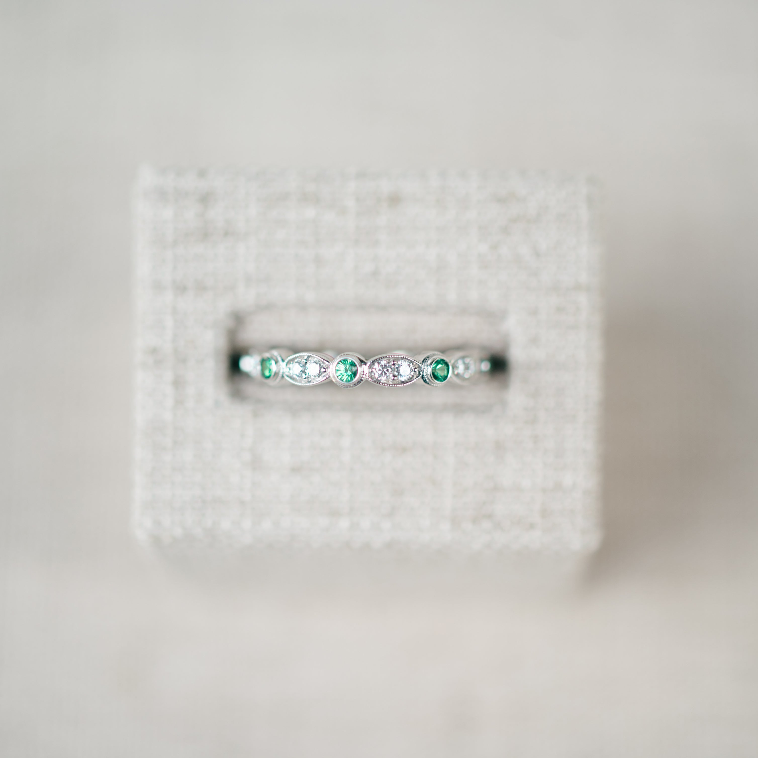 White Gold Diamond and Tsavorite Eternity Band